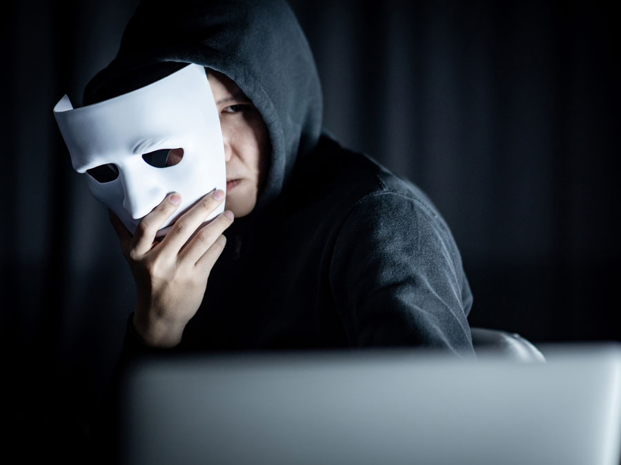 content moderation services depiction impersonation online stolen identity using laptop
