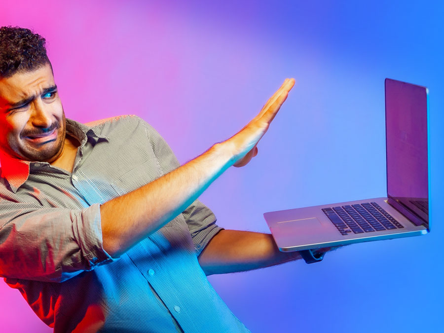 content moderation services depiction man terrified of laptop