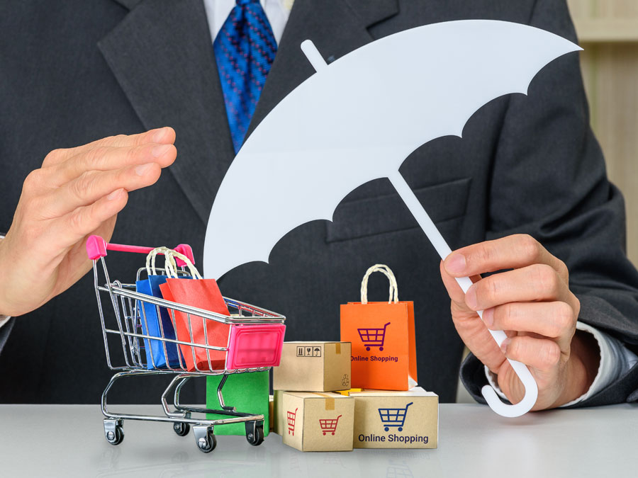 Outsourcing to a Call Center eCommerce Fraud prevention businessman umbrella on shopping carts