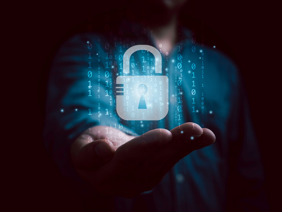 2024 data security threats information security depiction IT expert holding virtual padlock