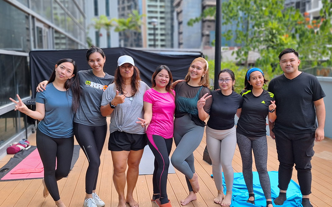 Attendees of Open Access BPO yoga sessions with Instructor Zee Villarin