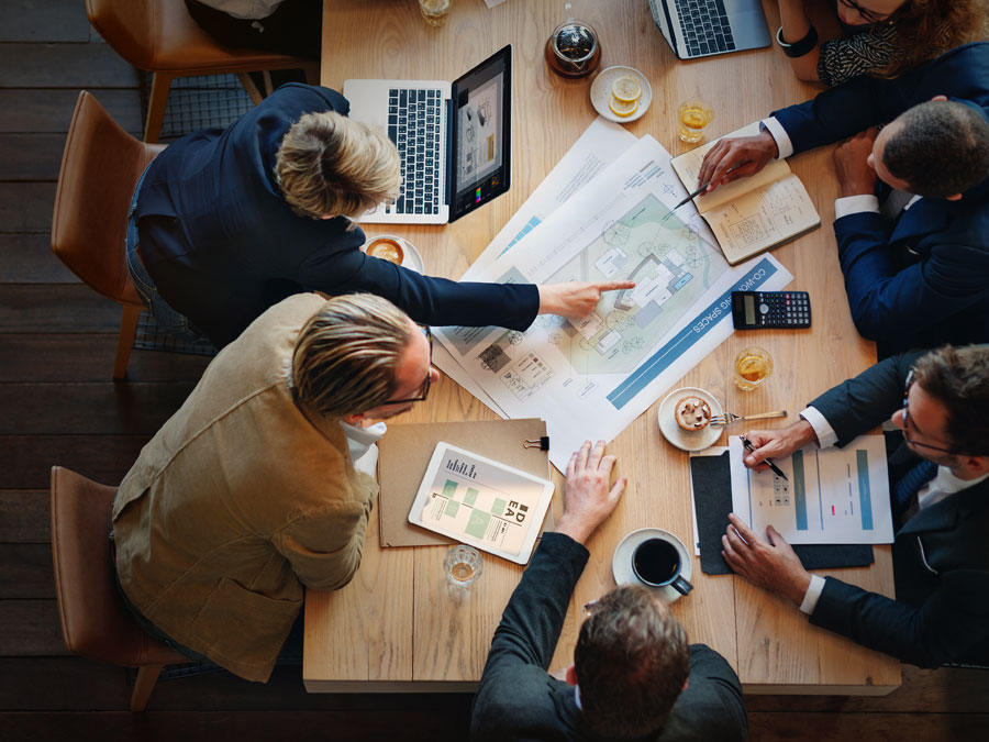 24 7 call center CX sales experts analyzing stats planning strategy new updates