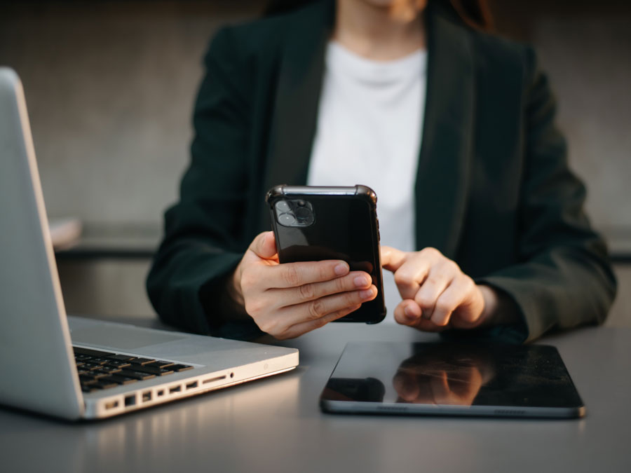 call center agent using laptop tablet smartphones