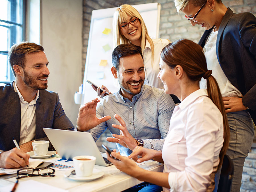 call center agents in a fun meeting