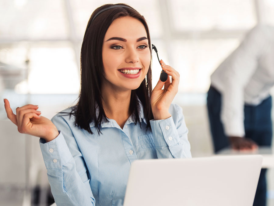 call center support services agent speaking to customer over the phone