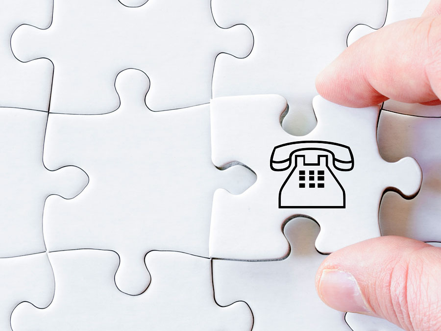 call center technologies depiction landline telephone on jigsaw puzzle