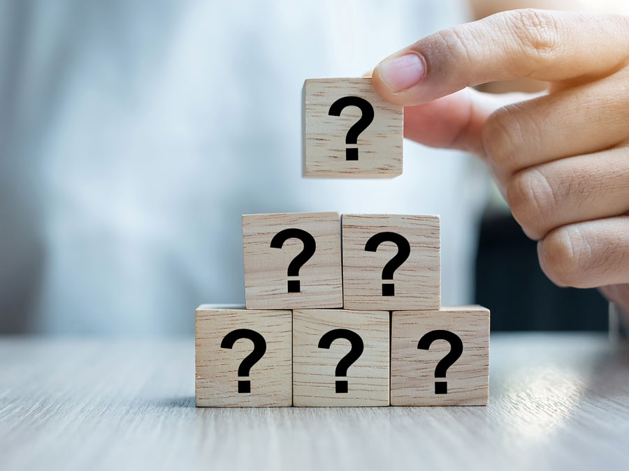 changing customer experience strategy question marks on blocks