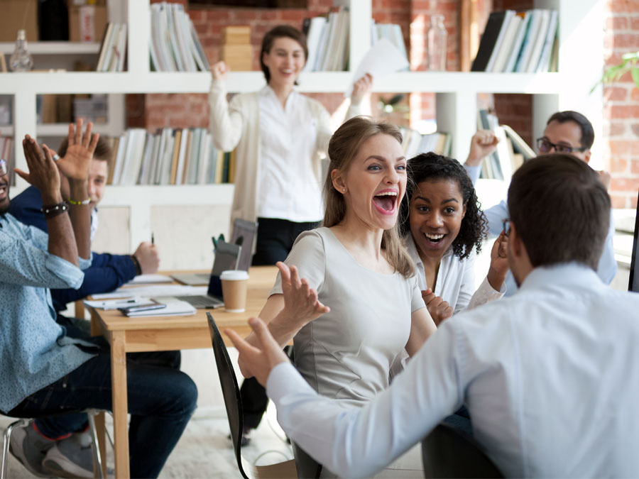 content moderator applauding coworker promoted career growth