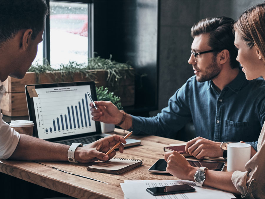 customer experience call center team reviewing date during meeting