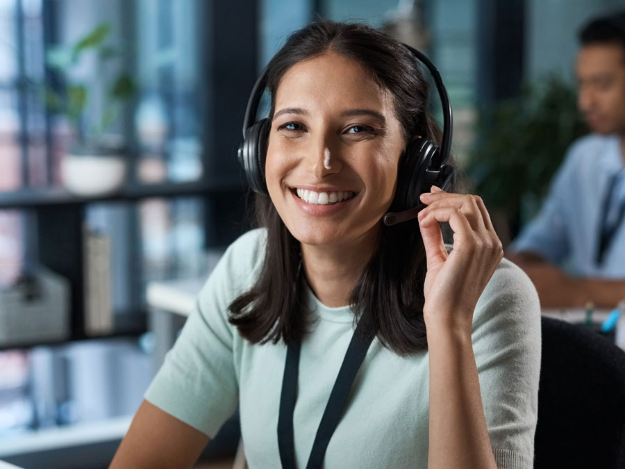 customer satisfaction agent in call center smiling 