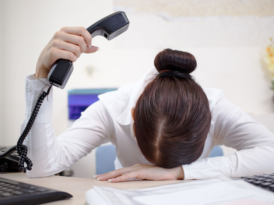 customer service blunders depiction frustrated caller head on table