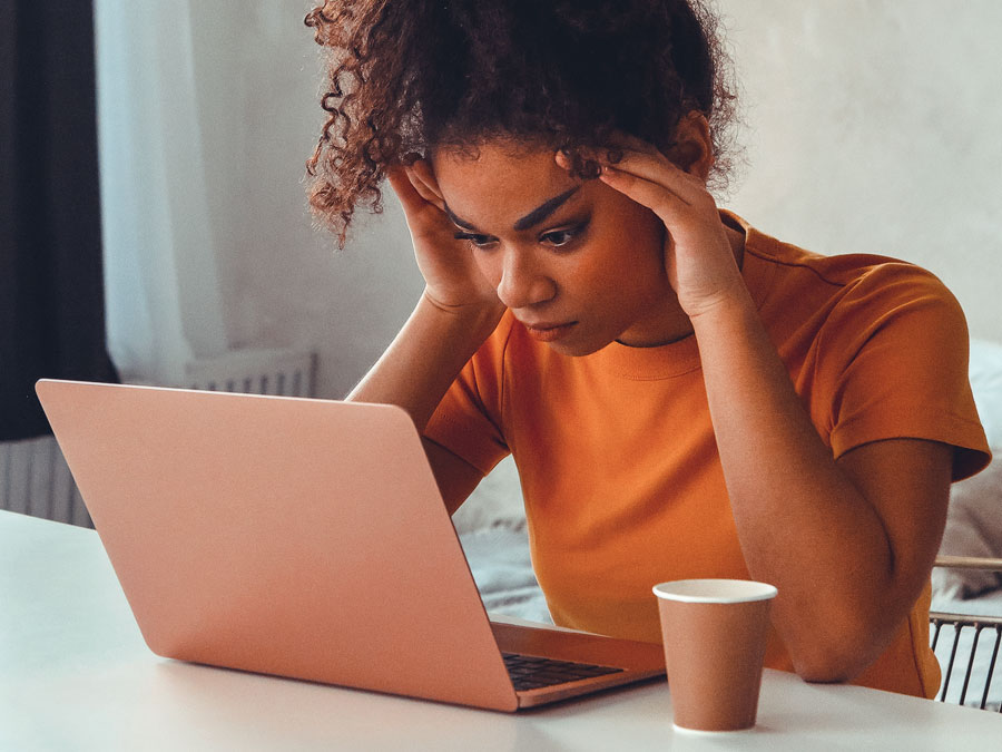 customer service blunders depiction frustrated woman staring at laptop