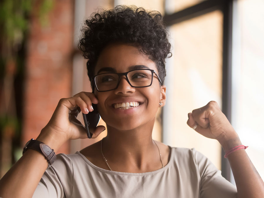 customer service caller excited delighted during phone conversation with call center 