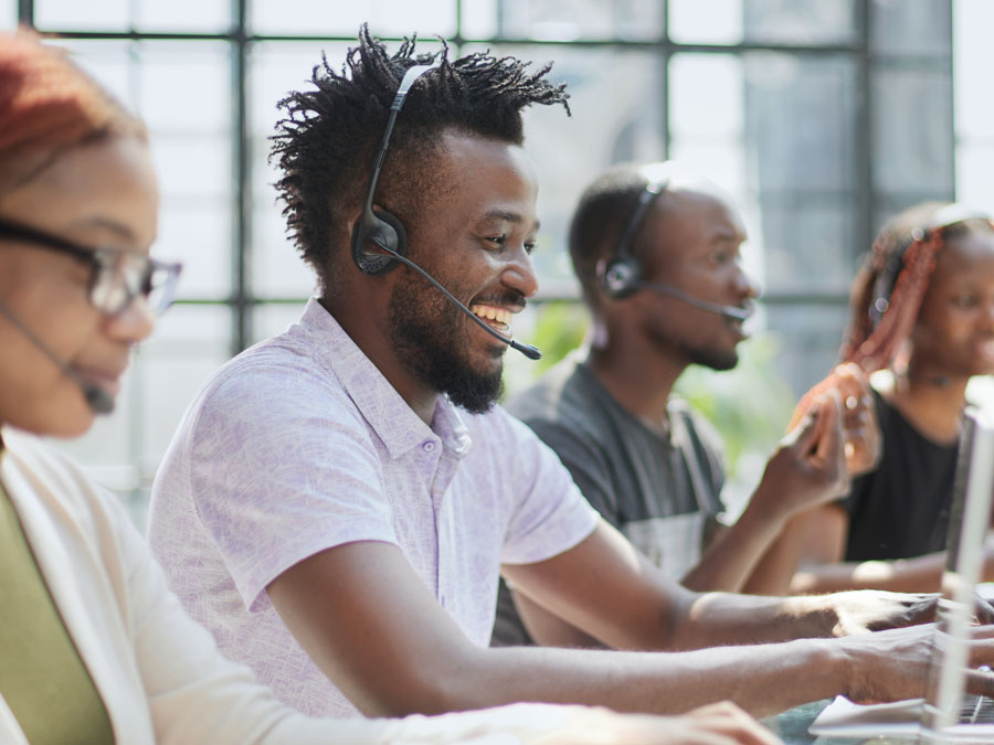 customer success team assisting consumers over the phone