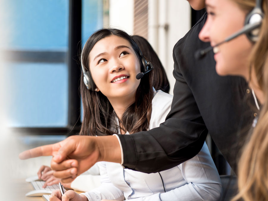 customer support call center agent receiving onboarding training