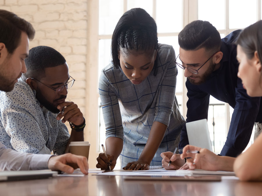 customer support team creating customer satisfaction surveys