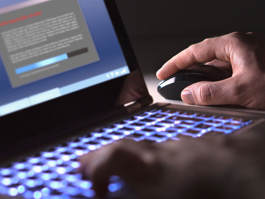data security expert scanning computer antivirus antimalware