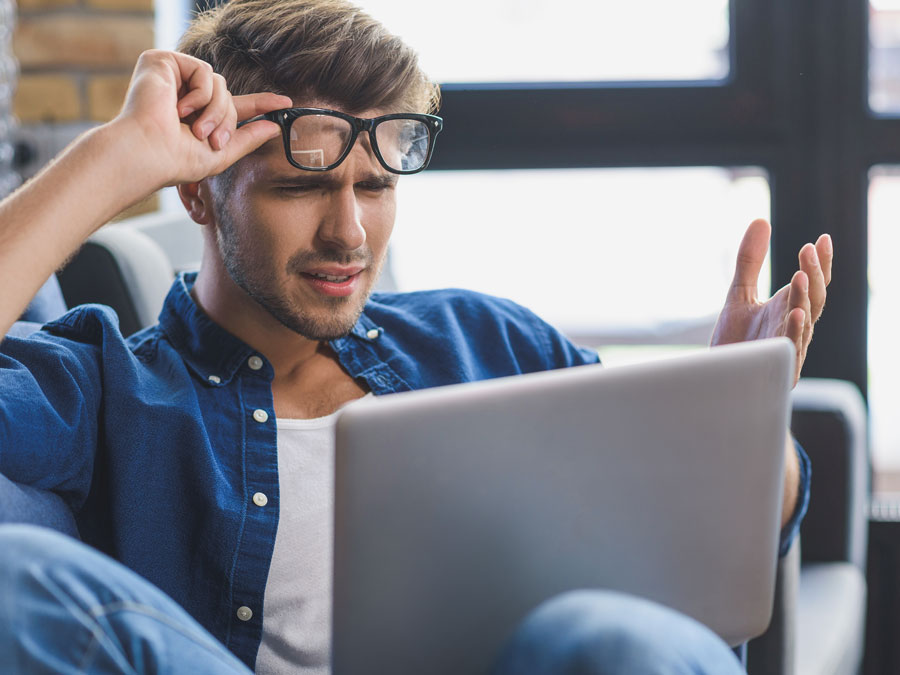 data security strategy confused shopper looking at laptop