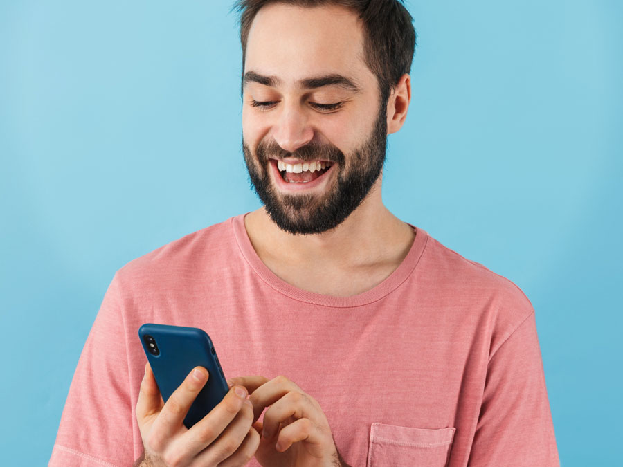 delighted customer using smartphone to access customer service app