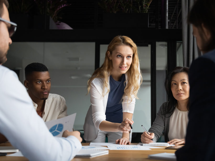 diverse customer support team in meeting training