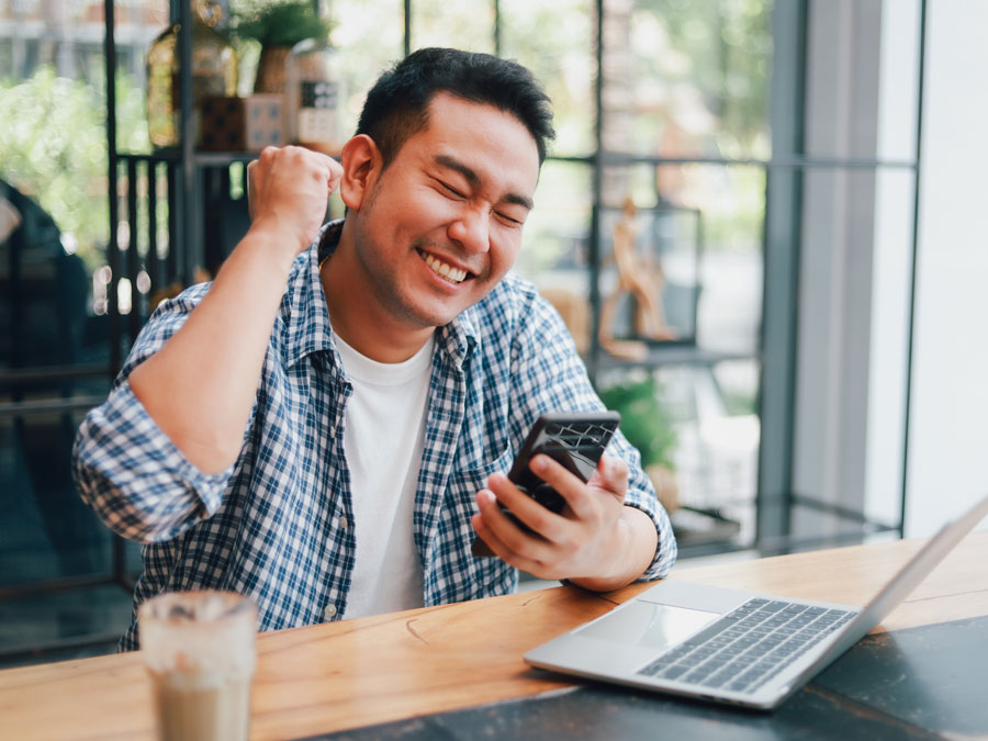 exceptional customer experience depicted by excited consumer assisted by call center representative on phone