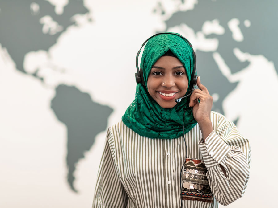 inclusive hiring depiction smiling customer experience call center agent near world map