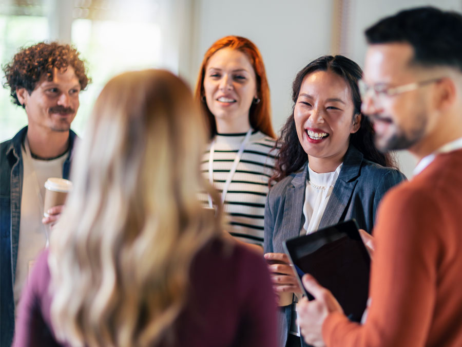 inclusive hiring team in meeting discussion in call center