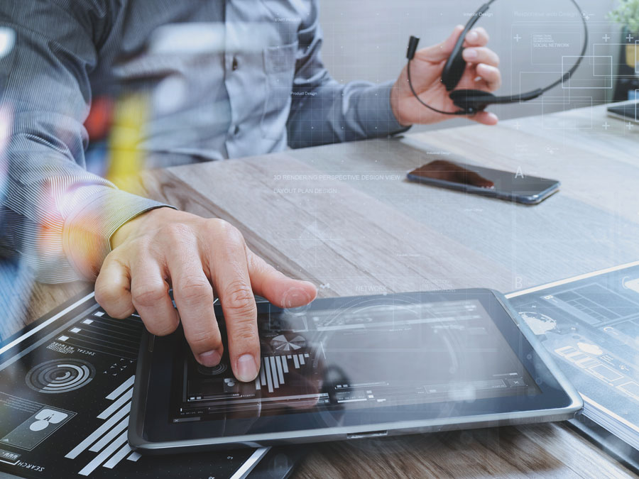 multilingual customer service agent using tablet laptop phone to assist consumers