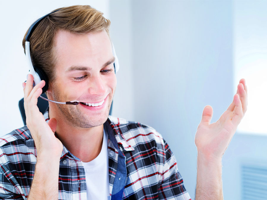 call center worker holding wall clock with customer on the phone