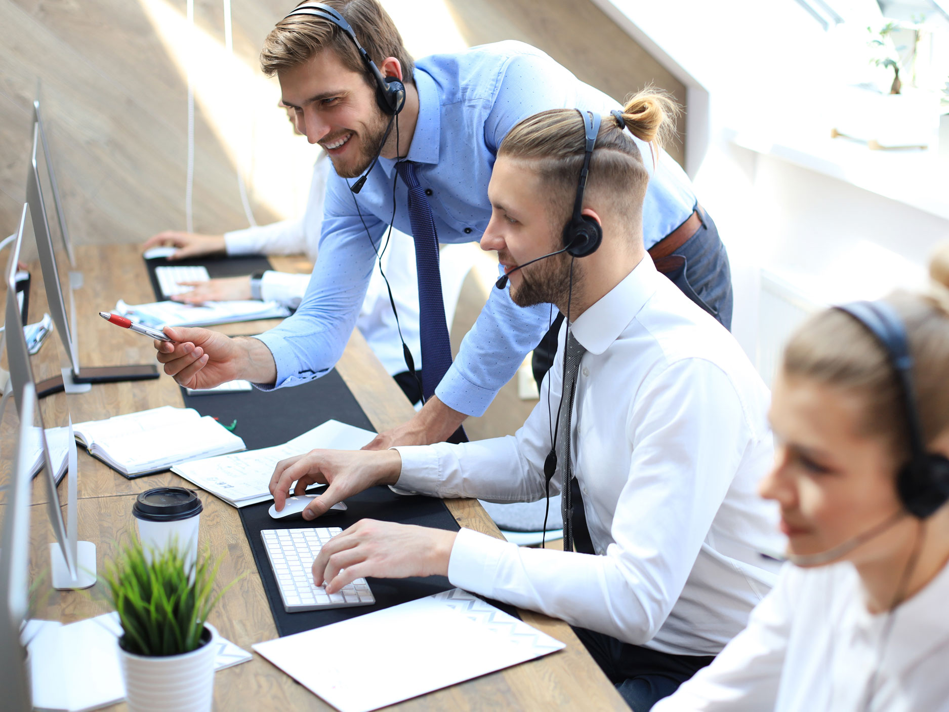 smart customer experience agents chatting in call center