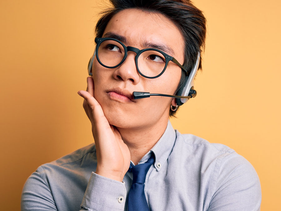 technical support call center agent thinking deeply