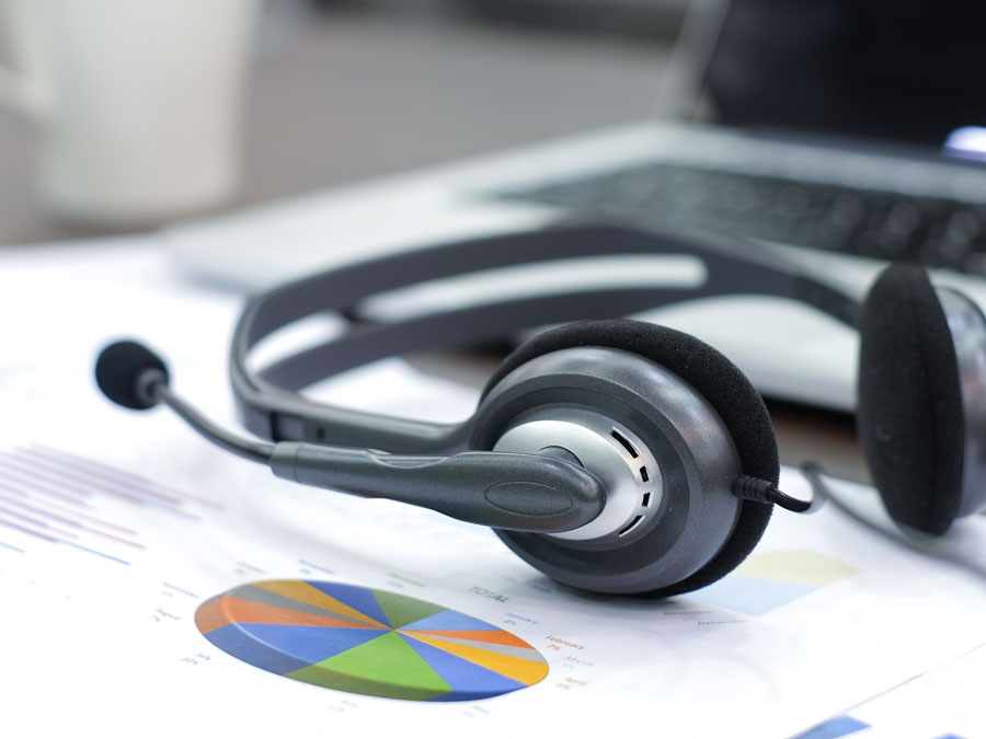 technical support call center headset on sales reports charts 