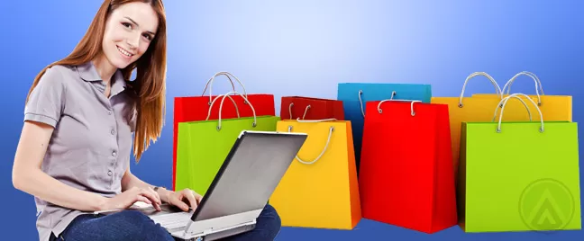female-with-laptop-and-shopping-bags