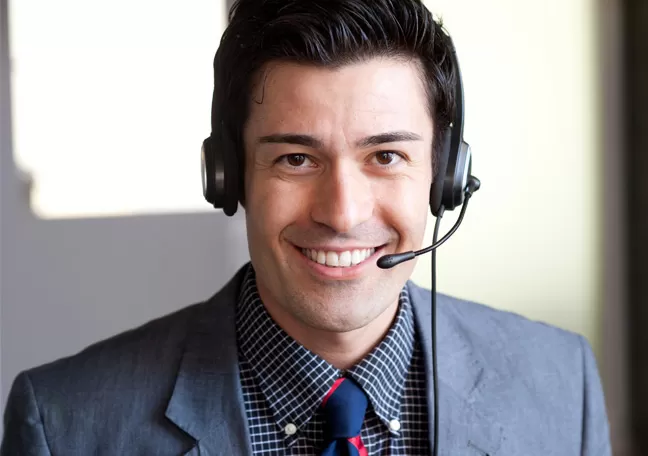 Improve-customer-support-by-instilling-purpose-in-CSRs--smiling-male-CSR--Open-Access-BPO