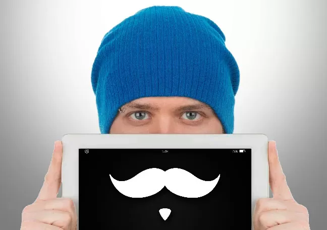 building customer trust depiction creating an online persona man with tablet showing mustache