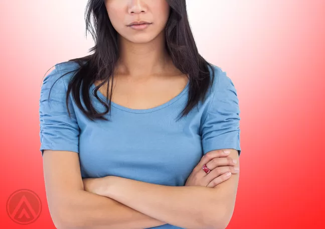 Asian-female-arms-crossed-dissatisfied