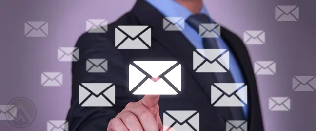 faceless-businessman-pushing-an-email-icon-surrounded-by-envelopes
