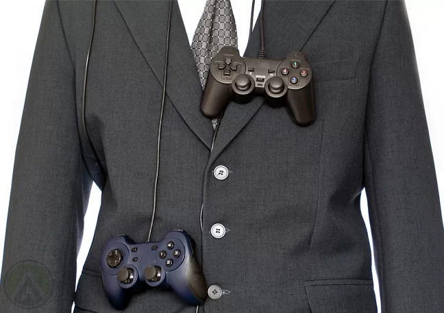 businessman-in-suit-game-console-controllers-hang