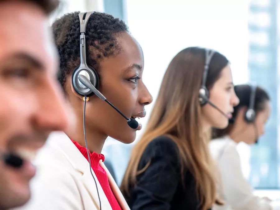diverse bilingual call center agents hard at work