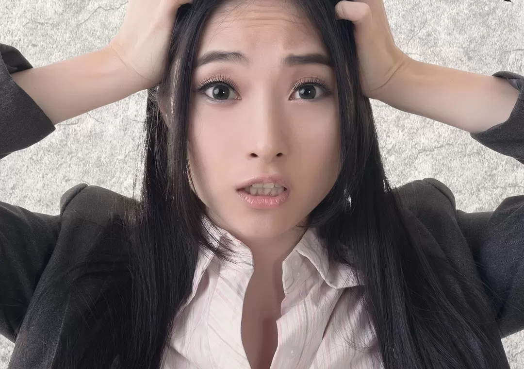 worried confused asian agent from bilingual call centers