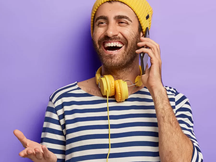 measure customer satisfaction engagement with brand depiction delighted customer excited on phone with customer experience reps