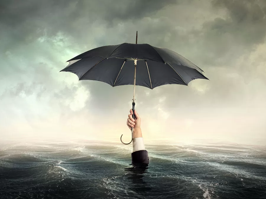 call center nightmares list natural disasters emergencies businessman in flood holding umbrella