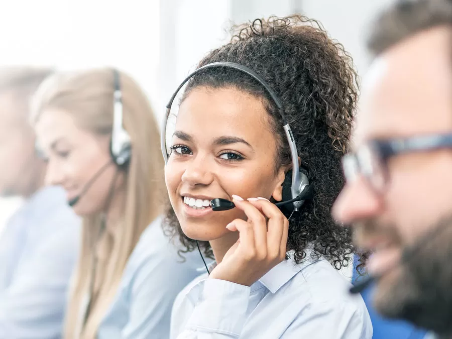 busy customer support agent in call center