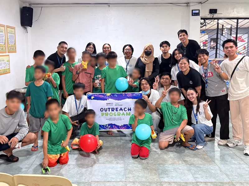 Open Access Community outreach programs bring volunteers and children together during an event, featuring group activities