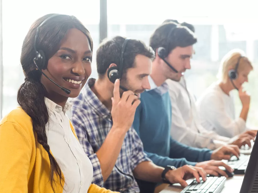 diverse call center team product of inclusive hiring at work assisting customers